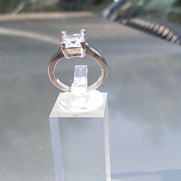 unbranded Jewelry - Princess cut white sapphire solitaire ring.